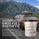 Full synthetic 0w20 pail in front of car driving through mountains